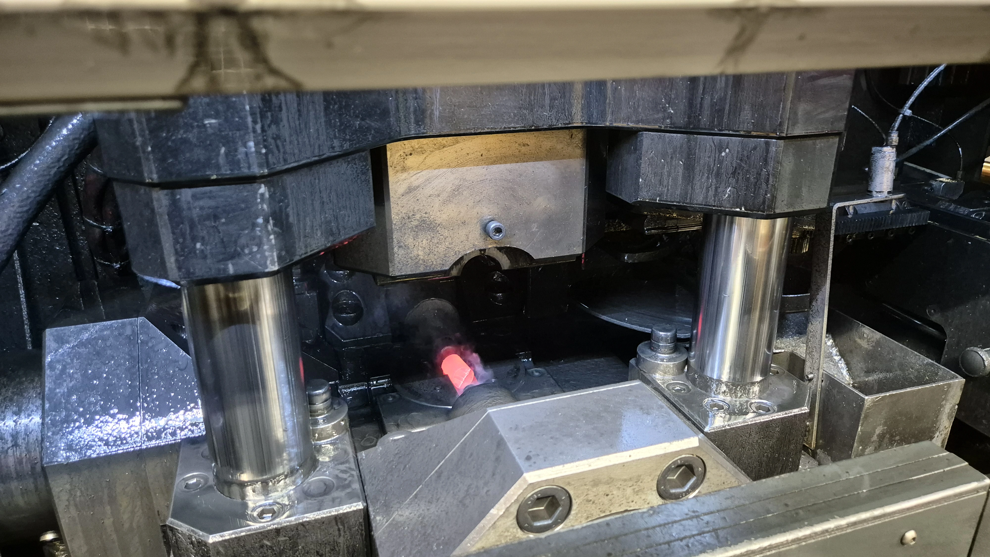 A hot forging process for a metal part